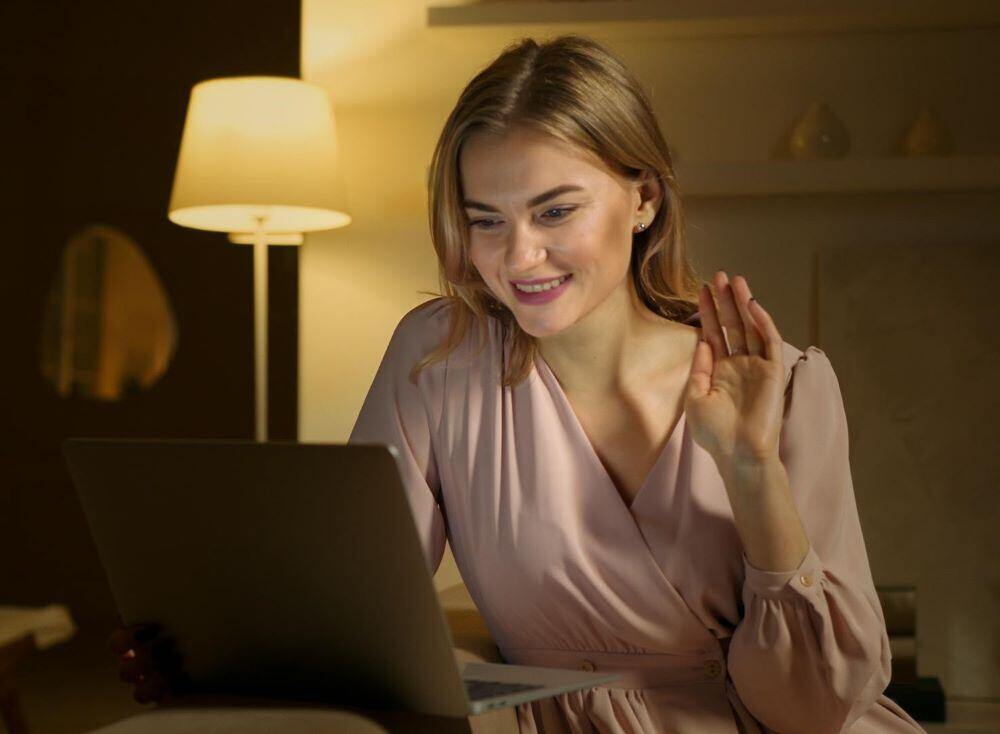 woman waving hello to her online credentialing exam study group