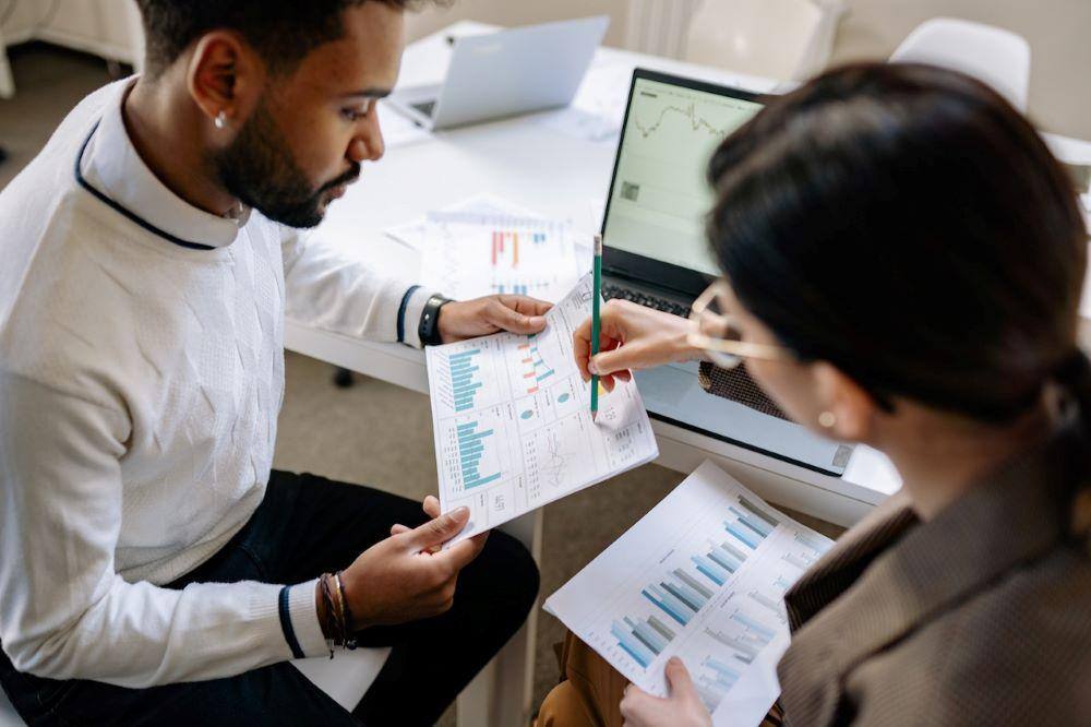 two people reviewing learning analytics