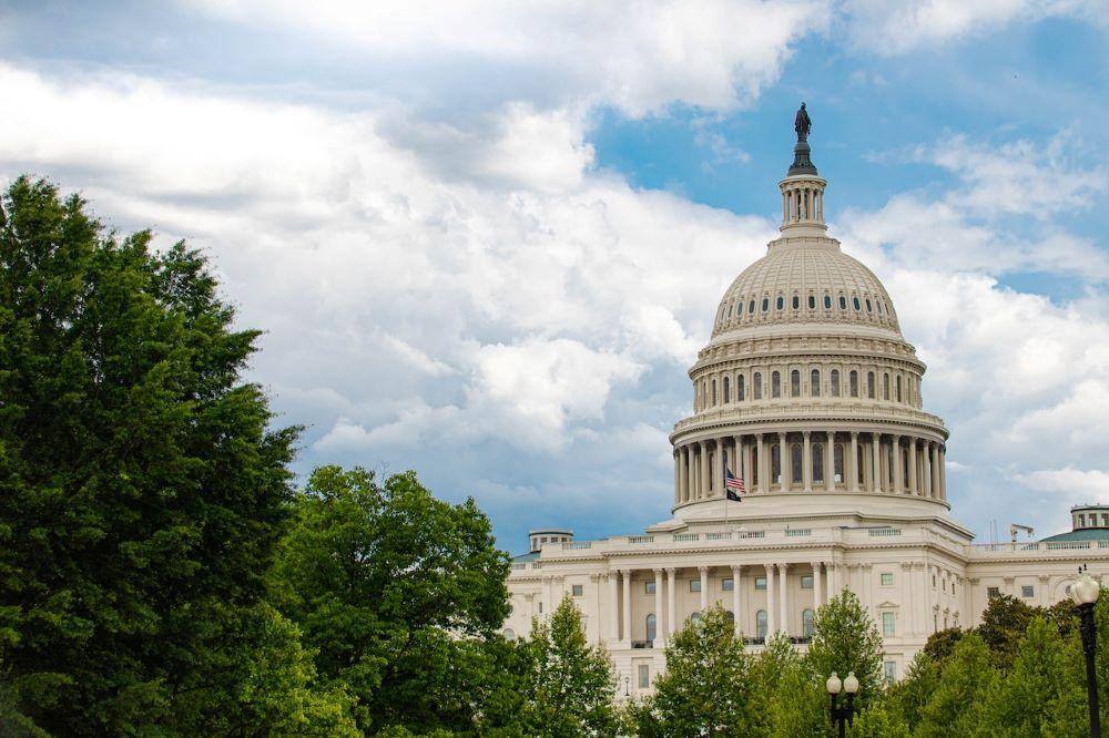 view of the U.S. Capitol where legislation is pending to change institutional qualifications for 529 savings plans